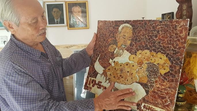 Tranh bằng vỏ măng cụt của họa sĩ Đỗ Năm. Tranh bằng vỏ măng cụt của họa sĩ Đỗ Năm.