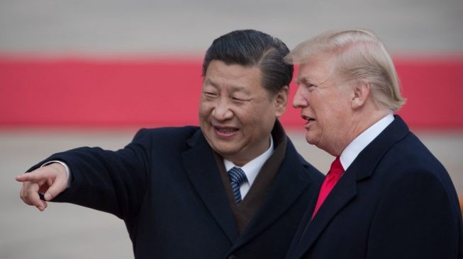 Ông Trump và ông Tập gặp mặt trong Hội nghị thượng đỉnh G20 vào năm 2018. (Ảnh: AFP)