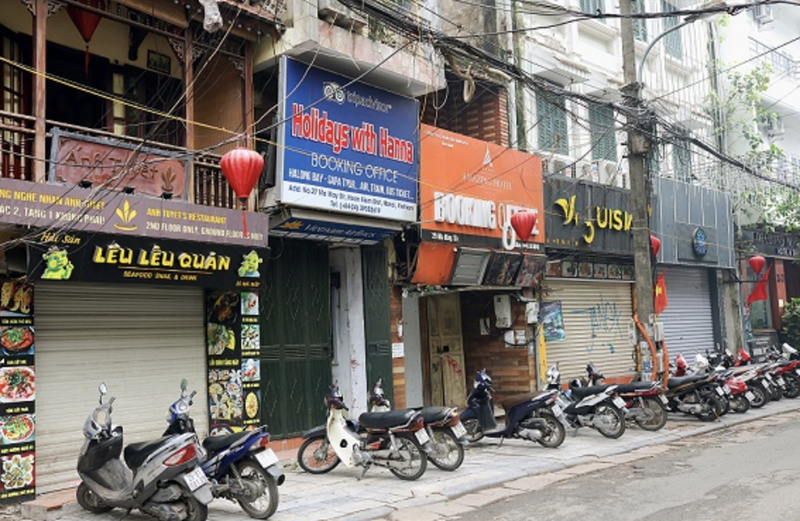 Nhiều cửa hàng đóng cửa vì COVID-19 (Ảnh - Nhật Bắc) Nhiều cửa hàng đóng cửa vì COVID-19 (Ảnh - Nhật Bắc)