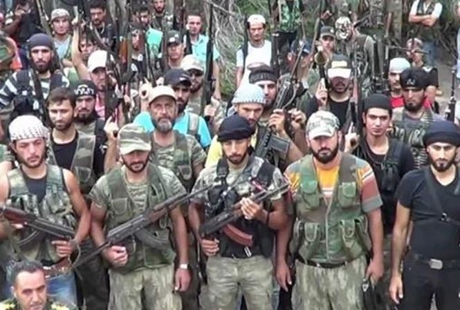 Nour al-Din al-Zenki - nhóm phiến quân gây ra nhiều tội ác chiến tranh. Nour al-Din al-Zenki - nhóm phiến quân gây ra nhiều tội ác chiến tranh.