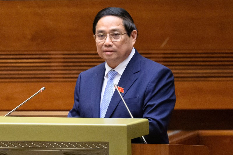 Thủ tướng Phạm Minh Chính báo cáo Quốc hội tình hình kinh tế - xã hội. Ảnh: Quốc hội. Anh 1.jpg