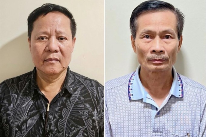 Bị can Đoàn Văn Huấn (trái) và Nguyễn Văn Chính, Phó tổng giám đốc Thái Dương. Ảnh: Bộ Công an. Anh 1.jpg