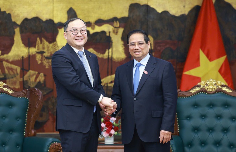 Thủ tướng Phạm Minh Chính tiếp ông Châu Gia Nghĩa, Chủ tịch châu Á-Thái Bình Dương của Tập đoàn Xây dựng Điện lực Trung Quốc. Ảnh: VGP. Anh 1.jpg