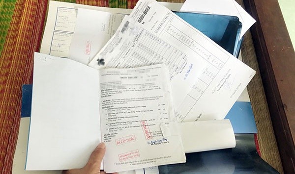 Phiếu khám bệnh, xét nghiệm của ông L.M.H. Ảnh: Báo Đồng Nai