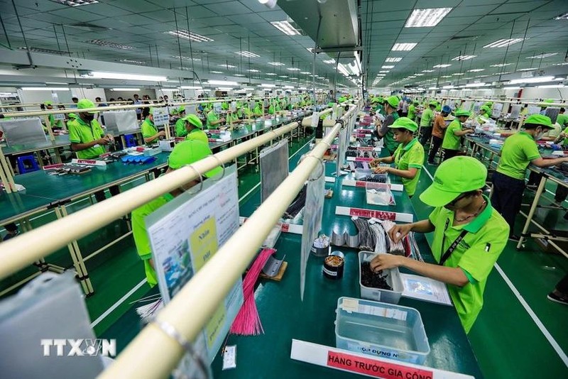 Hoạt động sản xuất tại một công ty ở thành phố Hòa Bình, tỉnh Hòa Bình. (Ảnh: Trọng Đạt/TTXVN). 20-5 doanh-nghiep-tu-nhan-4.jpg