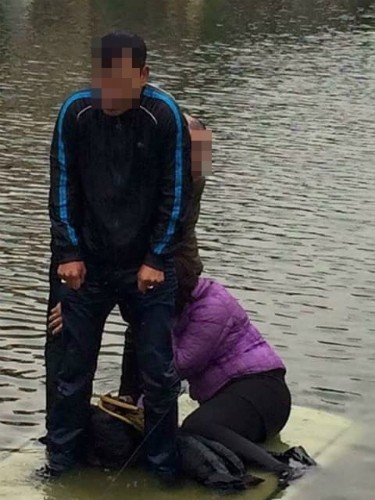 Clip nữ lái xe lùi xế hộp "tắm hồ" giữa trời lạnh 6 độ C ở Hà Nội  ảnh 1