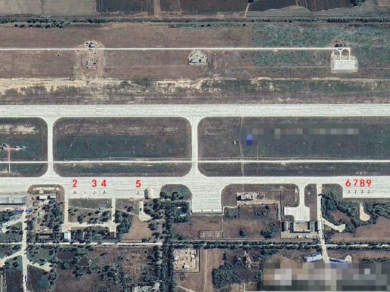 Ảnh vệ tinh chụp 9 máy bay không người lái tầm cao WZ-7 Xiang Long bố trí tại sân bay Song Liễu, gần biên giới Triều Tiên.