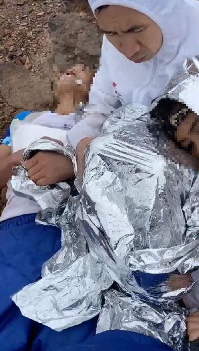 Các vận động viên tử nạn cho mất thân nhiệt (Ảnh: Dwnews).