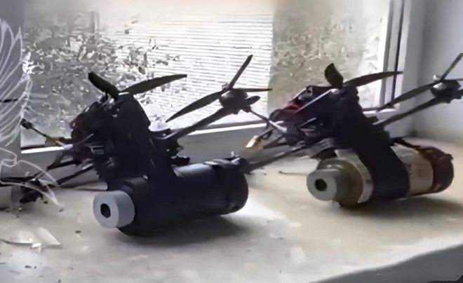 UAV mang theo thuoc no.jpg