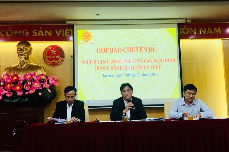 Ông Đặng Ngọc Minh, Phó Tổng cục trưởng Tổng cục Thuế chủ trì họp báo về Nghị định 126. Ảnh Duy Vũ