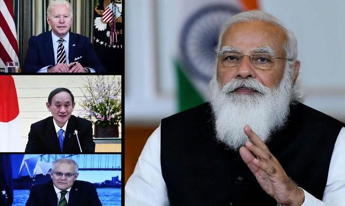 Thủ tướng Ấn Độ Narendra Modi (phải) trong hội nghị thượng đỉnh nhóm Bộ Tứ. Ảnh: AP.