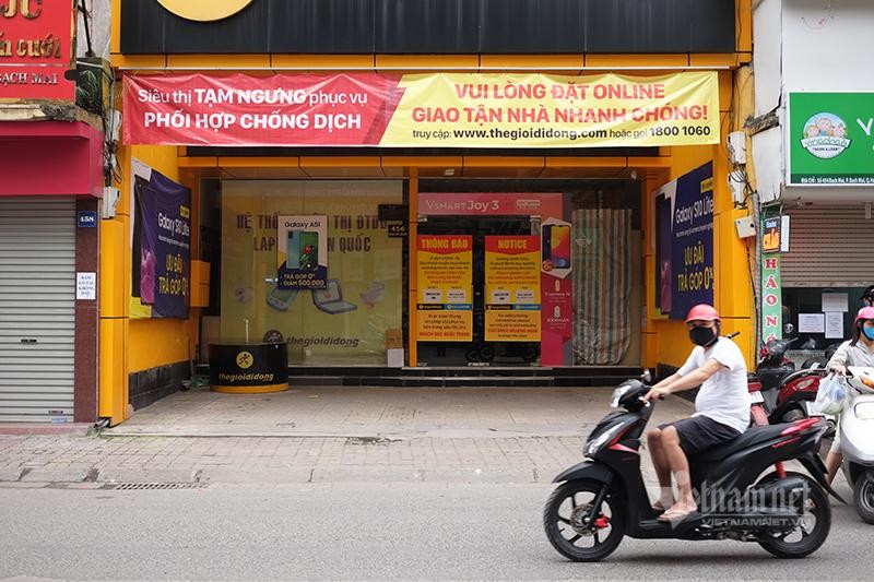 Viện dẫn lý do phải đóng cửa do điều kiện bất khả kháng, Thế giới di động đã ra văn bản thông báo việc không thanh toán hoặc chỉ thanh toán 30% tiền thuê mặt bằng với các đối tác của mình. Ảnh: Trọng Đạt