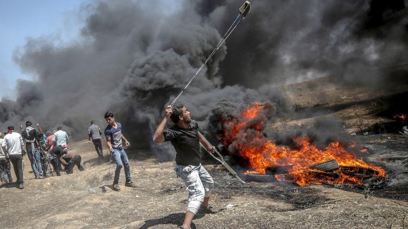 Người dân Palestines biểu tình phản đối Israel tại Gaza. Ảnh: DW Người dân Palestines biểu tình phản đối Israel tại Gaza. Ảnh: DW