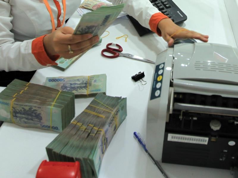 Nợ xấu dự kiến về dưới 3% vào cuối năm 2015. Ảnh:Đức Thanh