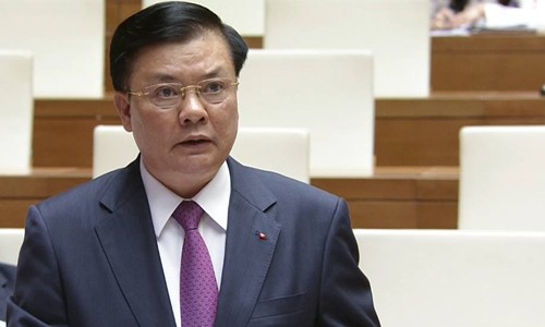 Bộ trưởng Tài chính Đinh Tiến Dũng thừa nhận khó truy thu tiền doanh nghiệp hưởng lợi từ lỗ hổng chính sách xăng dầu. Ảnh: QD.