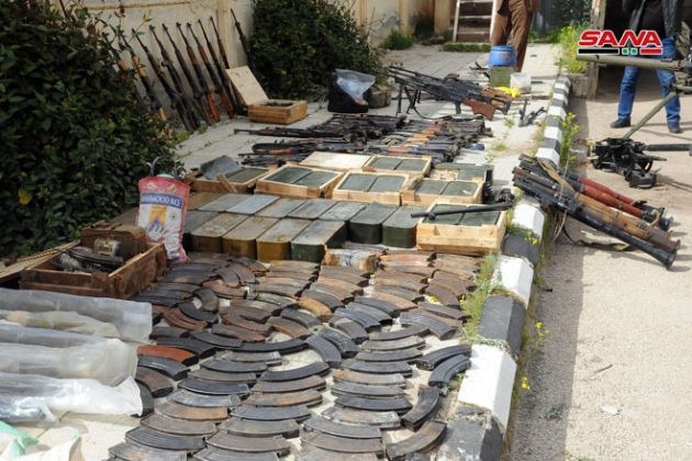 Những vũ khí trang bị phát hiện được trong kho vũ khí bí mật của các nhóm Hồi giáo cực đoan ở Daraa. Ảnh SANA