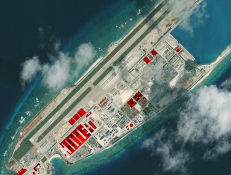 Đá Chữ Thập thuộc quần đảo Trường Sa của Việt Nam đang bị Trung Quốc chiếm đóng bất hợp pháp. Ảnh vệ tinh của CSIS 2017. Nguồn: DW.