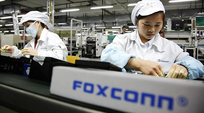 Công nhân Foxconn đang bị giảm giờ làm, hạ lương và cắt phúc lợi
ẢNH: AFP