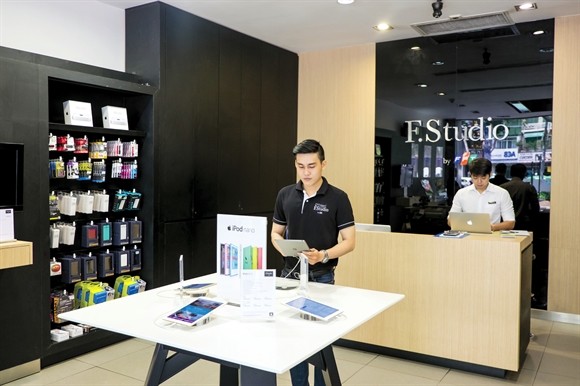 FPT dự kiến sẽ đổ vốn vào các mảng như xuất khẩu phần mềm, viễn thông, bán lẻ... - Ảnh: Linh Phạm FPT dự kiến sẽ đổ vốn vào các mảng như xuất khẩu phần mềm, viễn thông, bán lẻ... - Ảnh: Linh Phạm