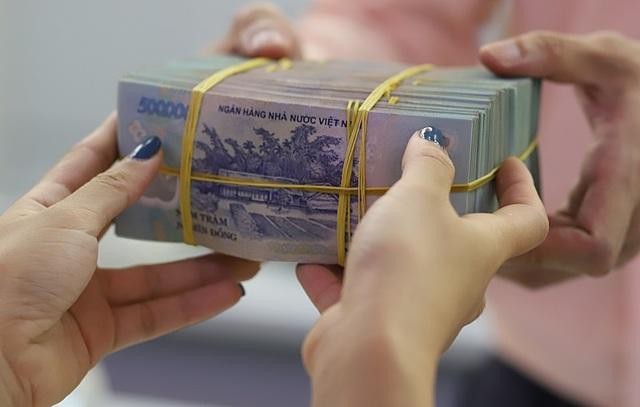 Một số nhà băng đã dùng hết hạn mức tăng trưởng tín dụng được NHNN cấp. Ảnh: Bảo Linh. Một số nhà băng đã dùng hết hạn mức tăng trưởng tín dụng được NHNN cấp. Ảnh: Bảo Linh.