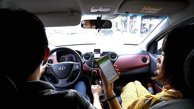 Grab tiếp tục phản đối “đeo mào” như taxi truyền thống