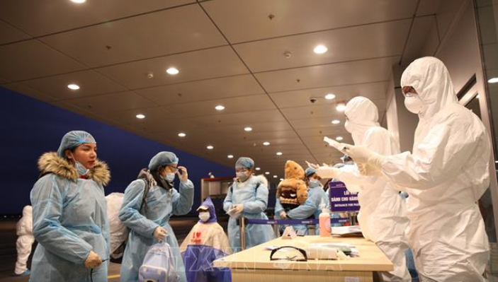 BV Đại học Y Dược TP.HCM sàng lọc virus Corona ngay tại khu vực đón tiếp bệnh nhân. ảnh 7 Sáng nay, thêm 30 công dân Việt Nam từ Vũ Hán đã về nước