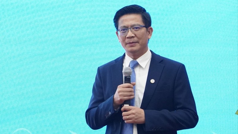 Ông Lê Văn Tuấn, Cục trưởng Cục Tần số vô tuyến điện trình bày tại Hội nghị..jpg