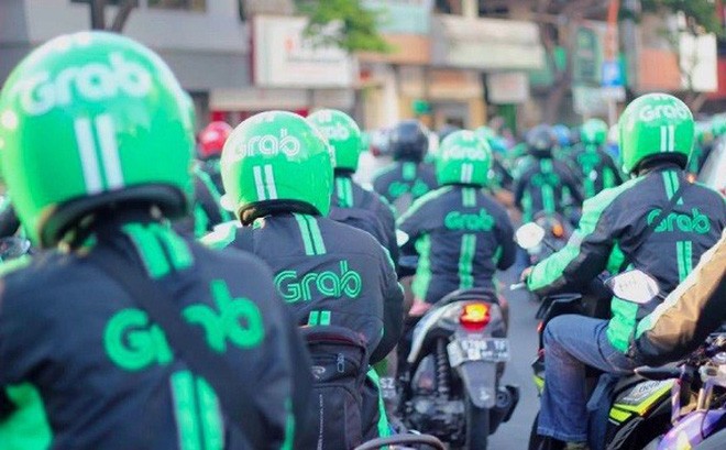 Grab vừa nhận thêm 1 tỷ USD từ các nhà đầu tư, chỉ hơn một tháng sau khi hãng nhận được 1 tỷ USD từ Toyota Motor Corp. (Ảnh: Bloomberg)