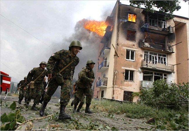 8.8.2008, khi tổng thống Putin đang tham dự khai mạc Olympic tại Bắc Kinh, Georgia đã triển khai hành động quân sự, tấn công vào khu vực ly khai Nam Ossetia. Ngay tại Bắc Kinh, ông Putin đã ra lệnh khai hỏa. Quân đội Nga đã tấn công các đơn vị Georgia tại Nam Ossetia rồi sau đó tiến sâu vào lãnh thổ nước này.