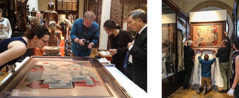 Các chuyên gia thẩm định và treo tranh tại MAA dưới sự chứng kiến của các chuyên gia hai nước. Ảnh tư liệu: VNFAM.
