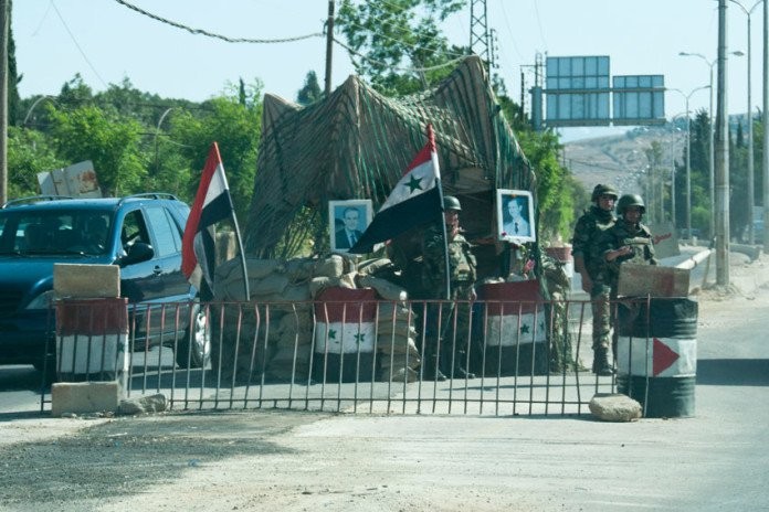 Một trạm kiểm soát của quân đội Syria ở Aleppo