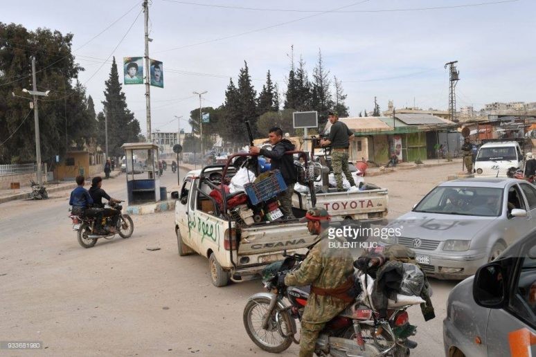 Các tay súng thánh chiến cướp bóc tài sản ở thành phố của người Kurd Afrin