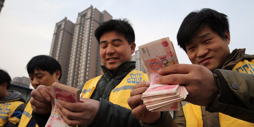 Tiền mặt ngày càng vắng bóng trong các hoạt động thương mại tại Trung Quốc (ảnh: Getty Images)