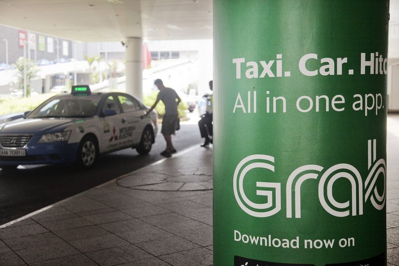 Grab sắp thâu tóm xong Uber Đông Nam Á (ảnh Bloomberg)