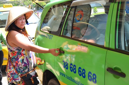 Nhiều hãng taxi ở TP HCM đang điều chỉnh giá cước. Ảnh: Tấn Thạnh