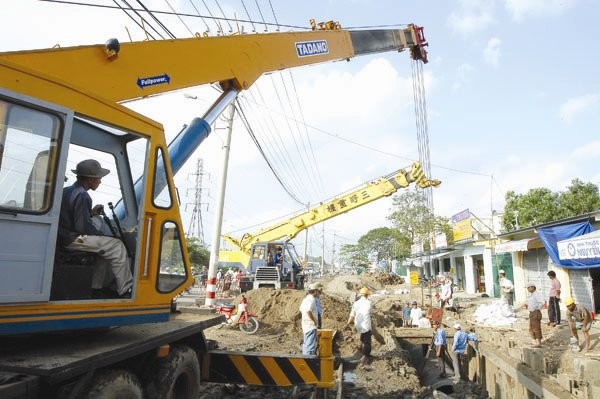 Xây dựng cơ bản là một trong những mảnh đất màu mỡ cho sự thông đồng, trục lợi, tham nhũng, bòn rút. Ảnh: KINH LUÂN