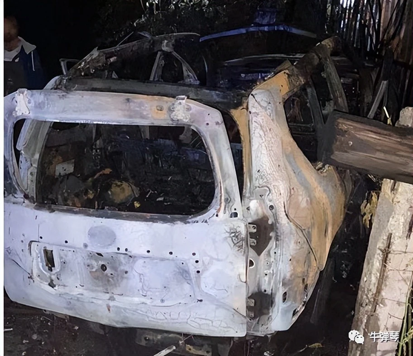 Phần còn lại của chiếc Toyota Lancruise Prado sau khi cháy nổ (Ảnh: QQ).