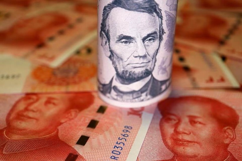 Goldman Sachs đã che giấu nguồn tiền được họ sử dụng để mua các công ty của Anh và Mỹ là của Chính phủ Trung Quốc (Ảnh: Reuters). Goldman Sachs thanh tay trong cua TQ.jpg