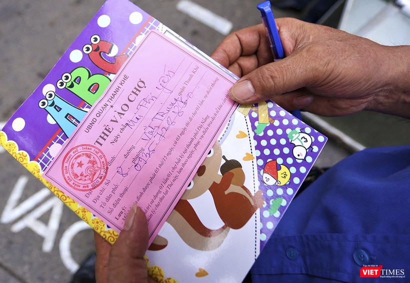 Cận cảnh một phiếu đi chợ ngày chẵn-màu hồng