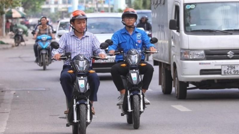 Sử dụng xe điện góp phần giảm tải lượng khí thải, nâng cao chất lượng không khí (ảnh: báo Nhân dân)