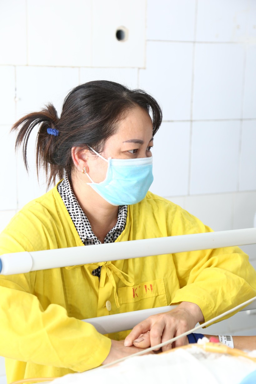 Chị Phạm Thị Mính - vợ anh Phạm Viết Mạc. Ảnh: BVCC