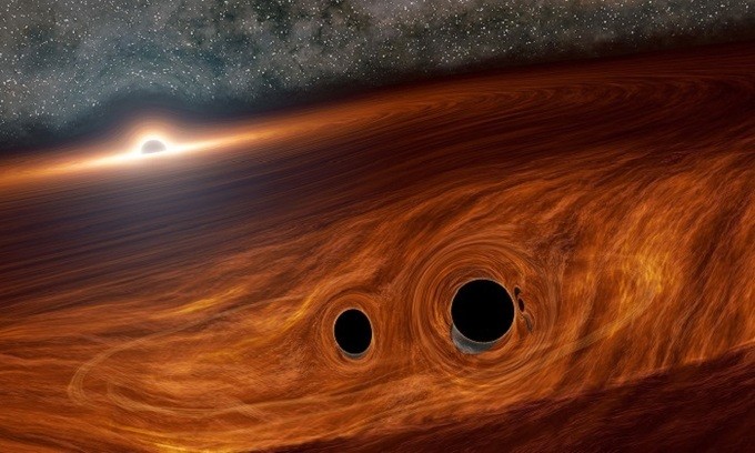 Mô phỏng vụ sáp nhập của hai hố đen xảy ra gần hố đen thứ ba. Ảnh: NASA.