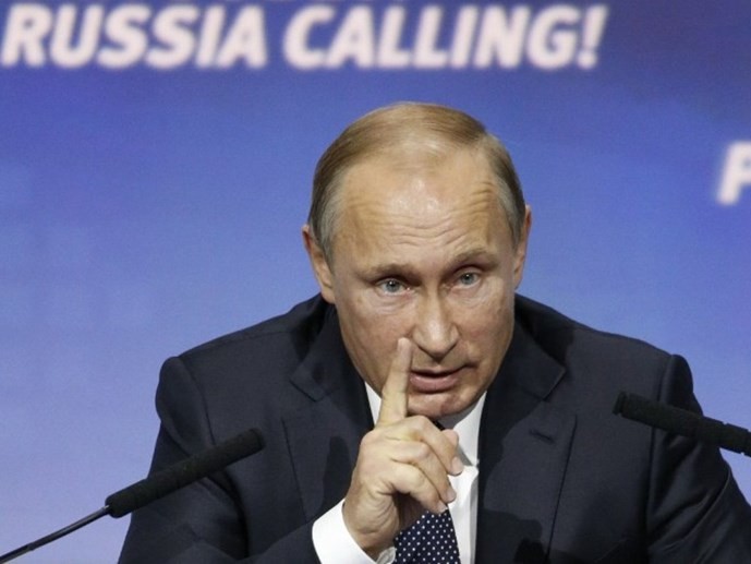 Báo Mỹ The New York Times cho rằng Tổng thống Putin sẽ hành động quyết liệt hơn ở Syria nếu IS đúng là những kẻ đứng sau vụ khủng bố làm rơi máy Nga vừa qua - Ảnh: AFP